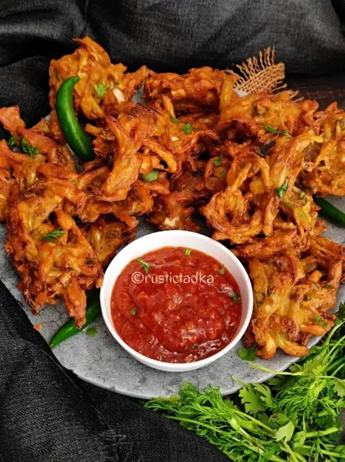 A super crispy, tasty & easy to make fritters made with shredded cabbage & spices. A vegan dish