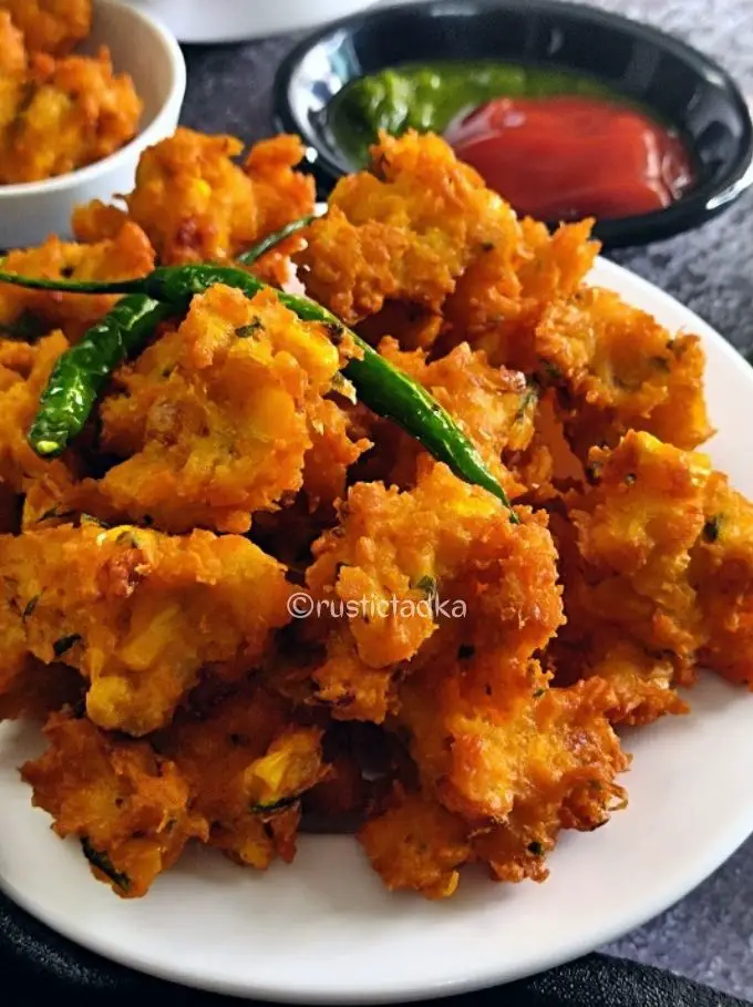 A super crispy & delicious snack made with boiled sweet corns & spices. Deep fried snack.